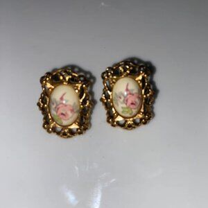 Vintage gold tone, metal clip on earrings oval floral cameo type